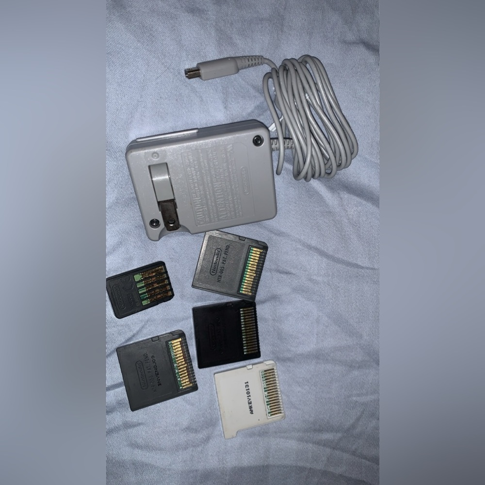 Nintendo SD charger & 5 games